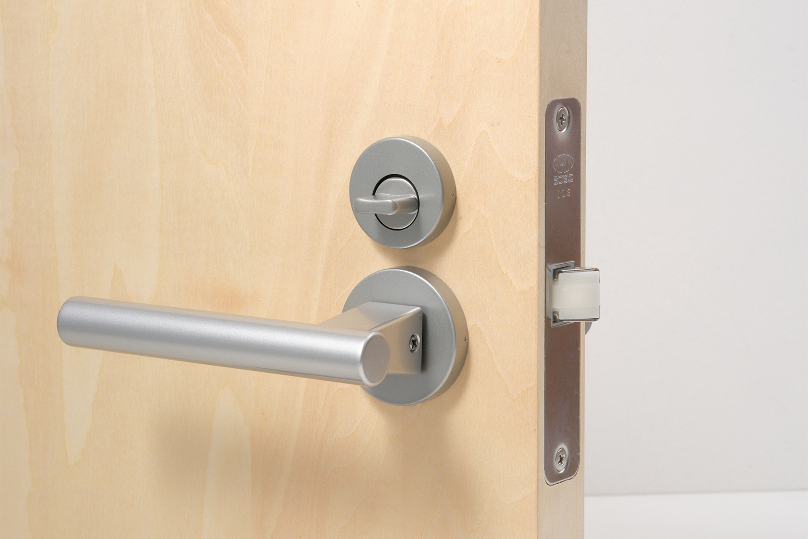 木製ユニットドア 開き戸 シナ DW-DR012-04-G191 オプションの表示錠のつまみ（施錠時）