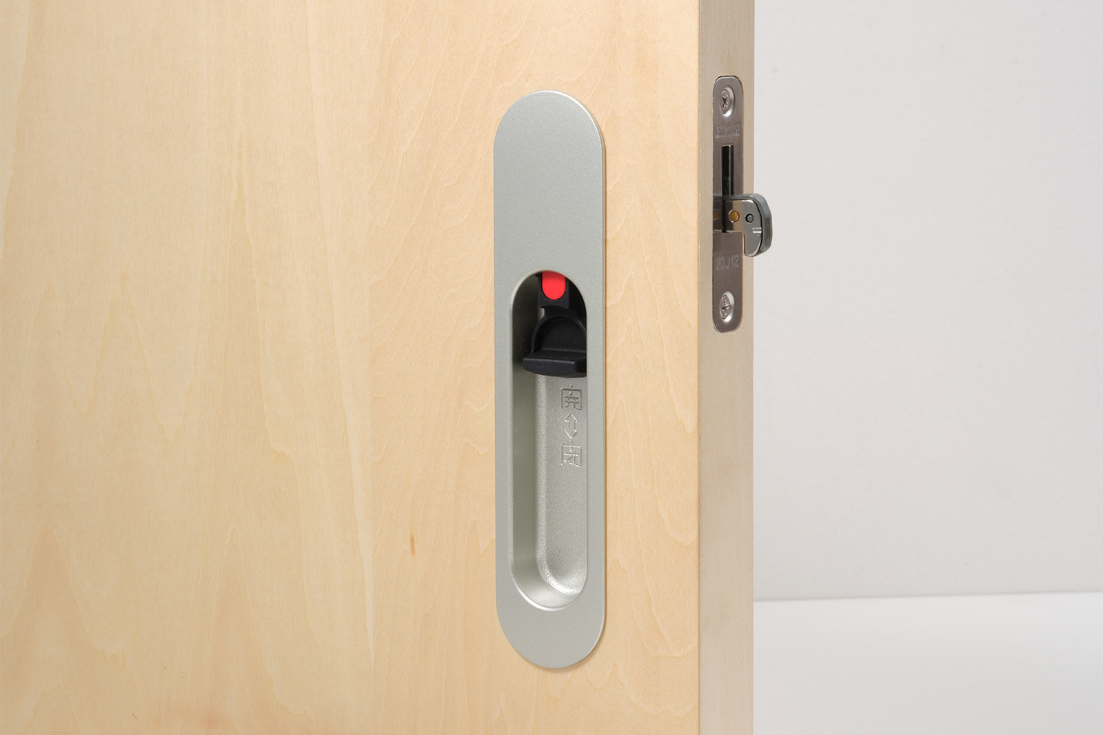 木製ユニットドア 片引き戸 シナ DW-DR012-06-G191 オプションの表示錠のレバー（施錠時）